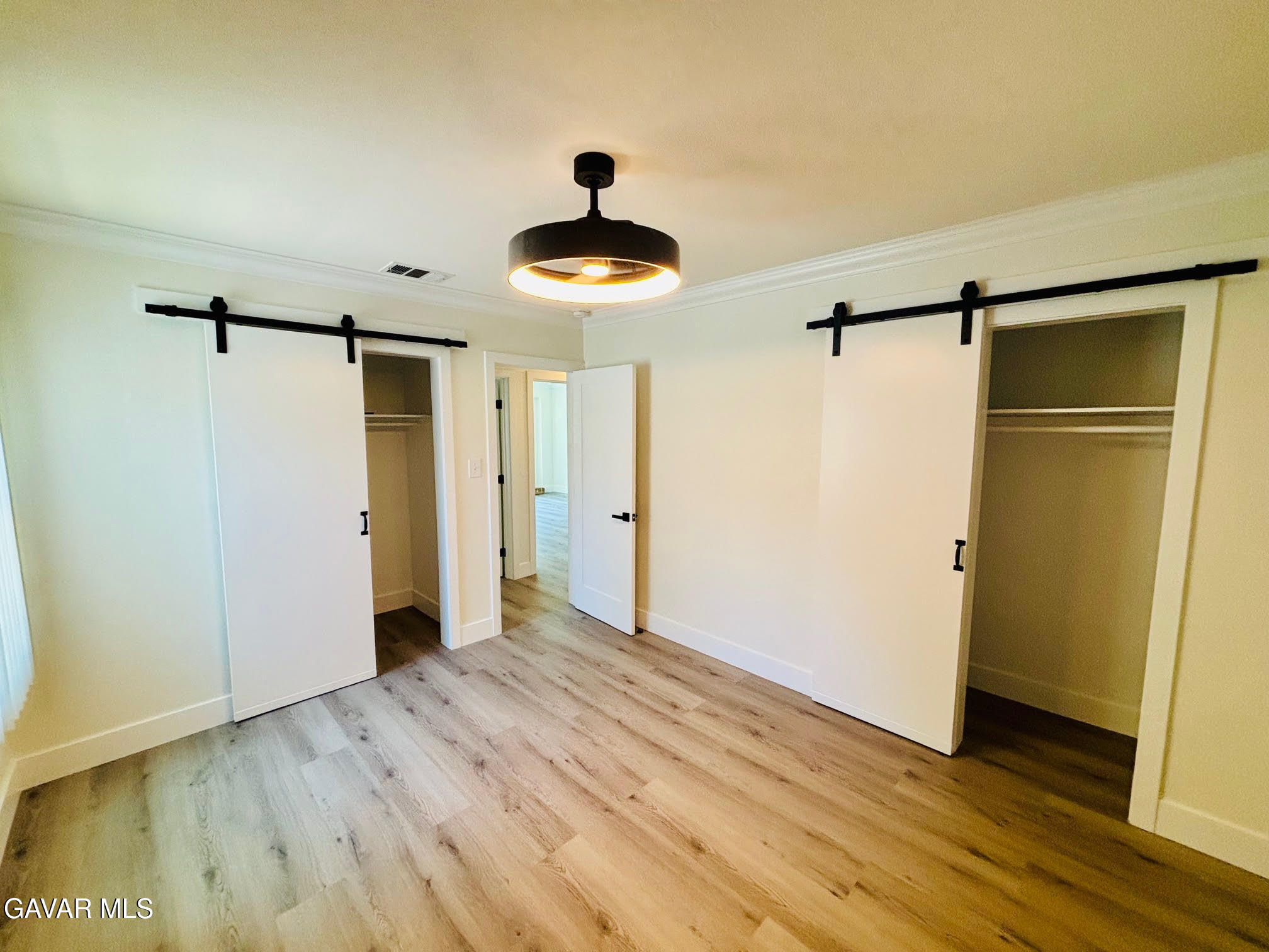 6534 Balcom Avenue Reseda, CA 91335 - Photo 17 of 25 a view of empty room with wooden floor