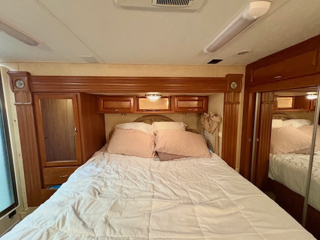 20-57 Woodhaven Sublette, IL 61367 - Photo 11 of 16 a bedroom with a large bed and a mirror