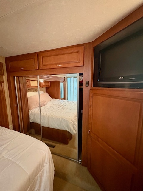 20-57 Woodhaven Sublette, IL 61367 - Photo 12 of 16 a bedroom with a bed and a tv