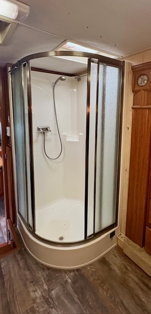 20-57 Woodhaven Sublette, IL 61367 - Photo 15 of 16 a bathroom with a glass shower door