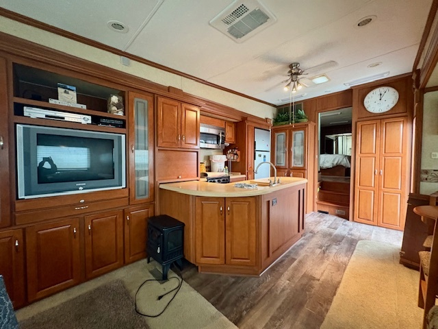 20-57 Woodhaven Sublette, IL 61367 - Photo 8 of 16 a kitchen with sink refrigerator and window