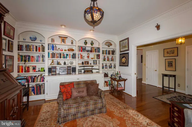 a kitchen with stainless steel appliances granite countertop a sink and a refrigerator