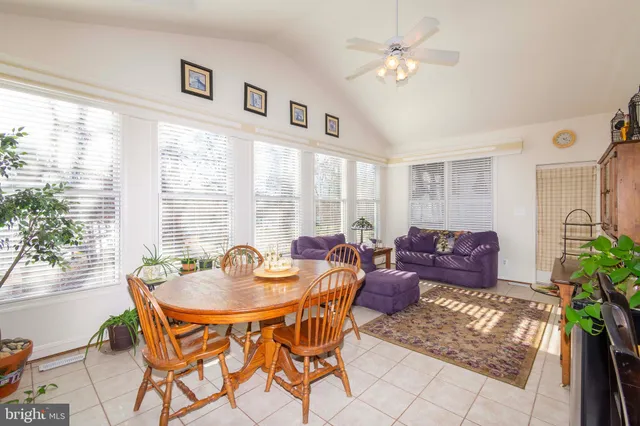 a bedroom with bed and window