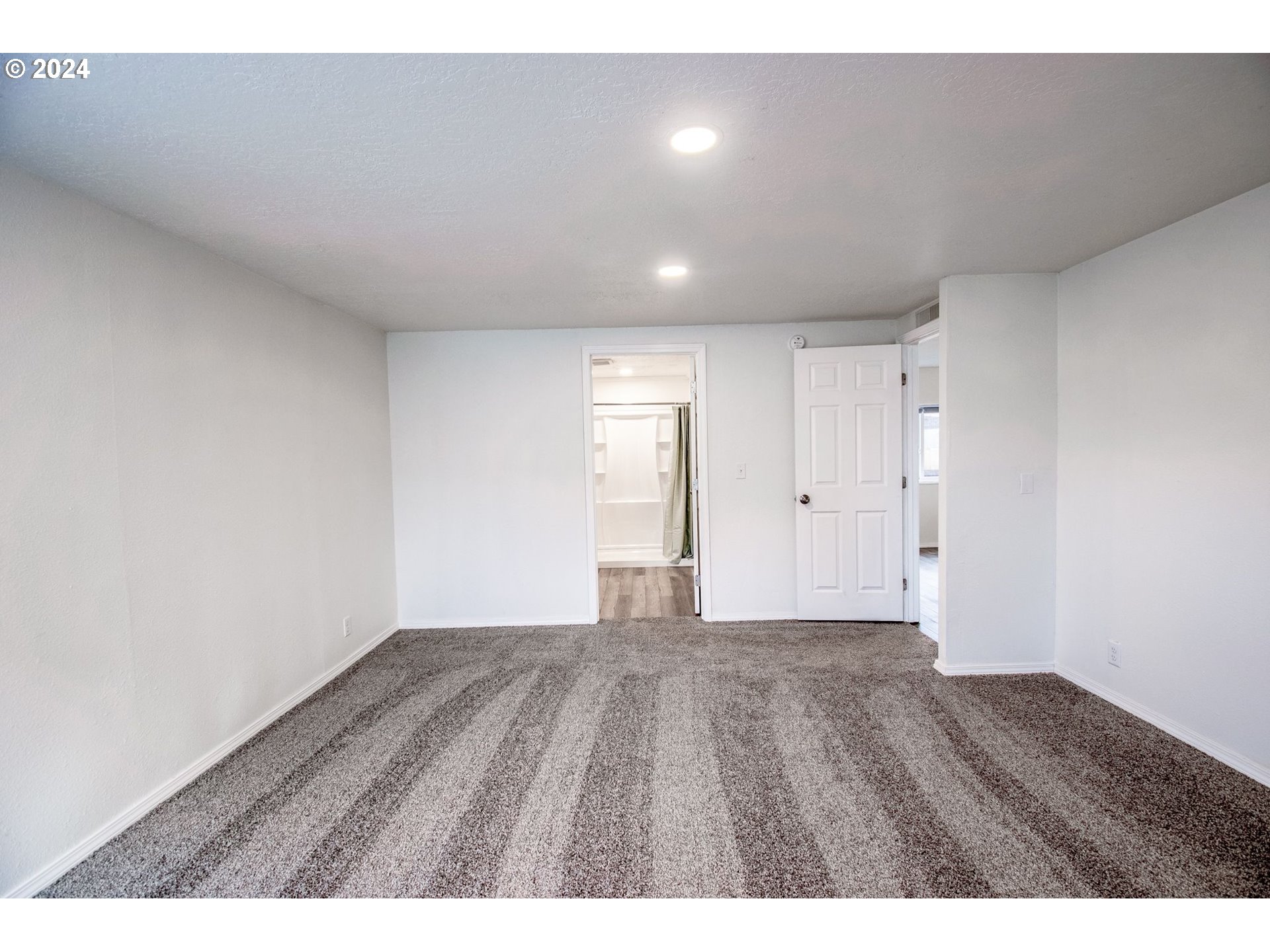 247 37th Street Springfield, OR 97478 - Photo 13 of 30 a view of an empty room with wooden floor