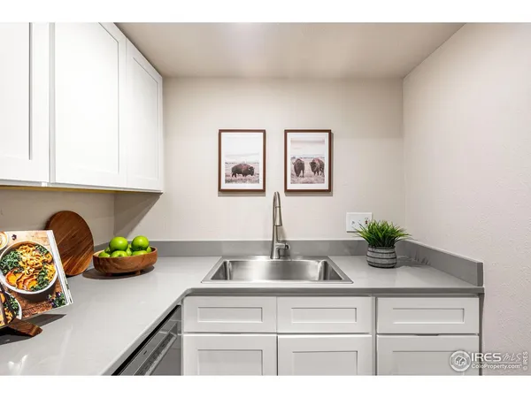 a kitchen with a sink and a cabinets
