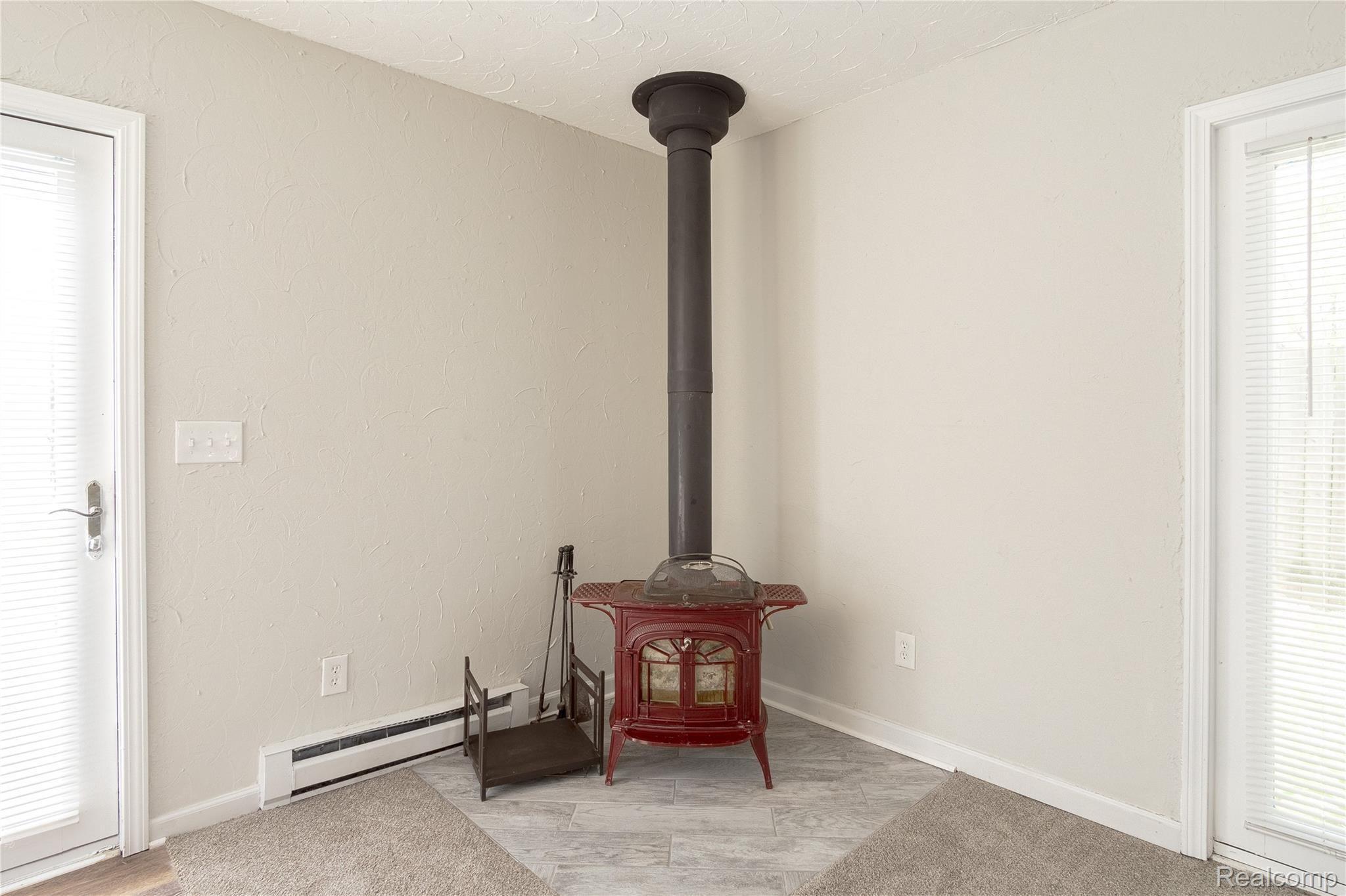 4351 Hatchery Road Waterford, MI 48329 - Photo 12 of 24 Wood burning stove