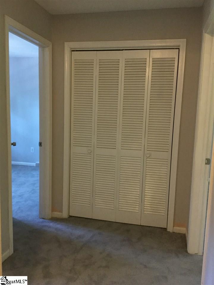 609 Neely Ferry Road Simpsonville, SC 29680 - Photo 12 of 27 Top of stairs Landing, great storage with two closets leads to upstairs bedrooms.