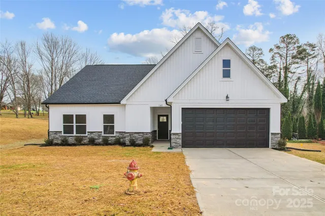 a front view of house with yard