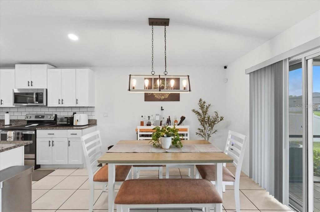 1923 Red Loop Lakeland, FL 33801 - Photo 18 of 51 a view of kitchen with sink and microwave