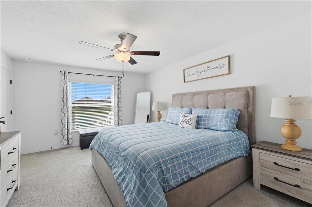 1923 Red Loop Lakeland, FL 33801 - Photo 25 of 51 a bedroom with a bed and a window