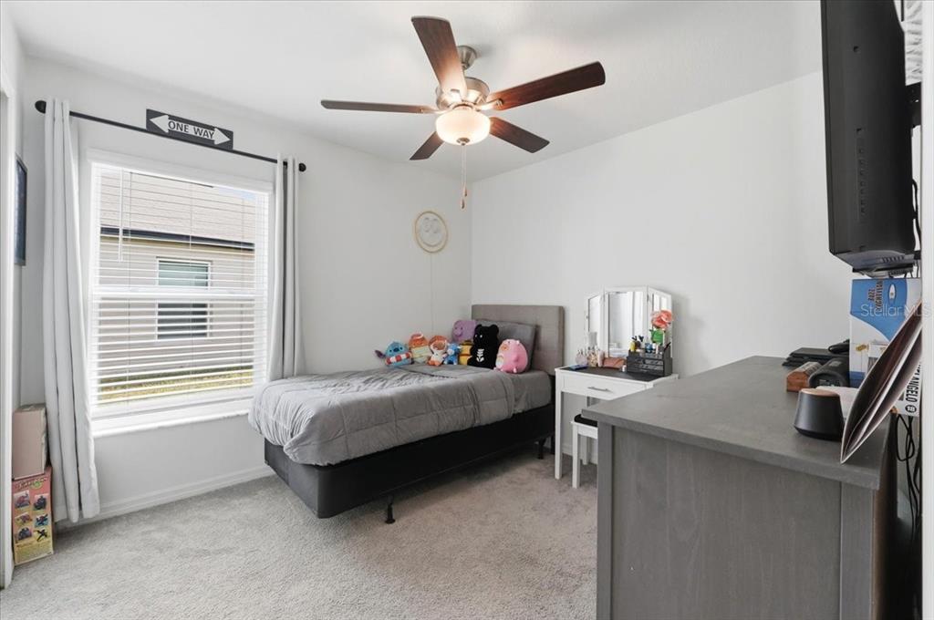 1923 Red Loop Lakeland, FL 33801 - Photo 32 of 51 a bed room with a bed and a window