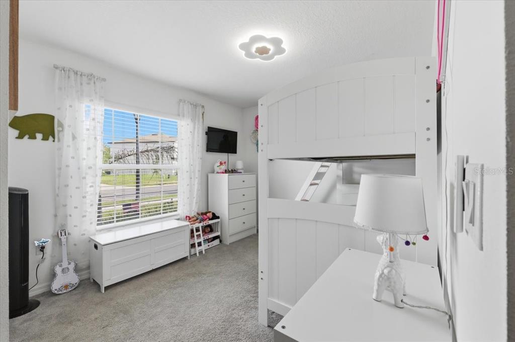 1923 Red Loop Lakeland, FL 33801 - Photo 34 of 51 a room with a bed and a window