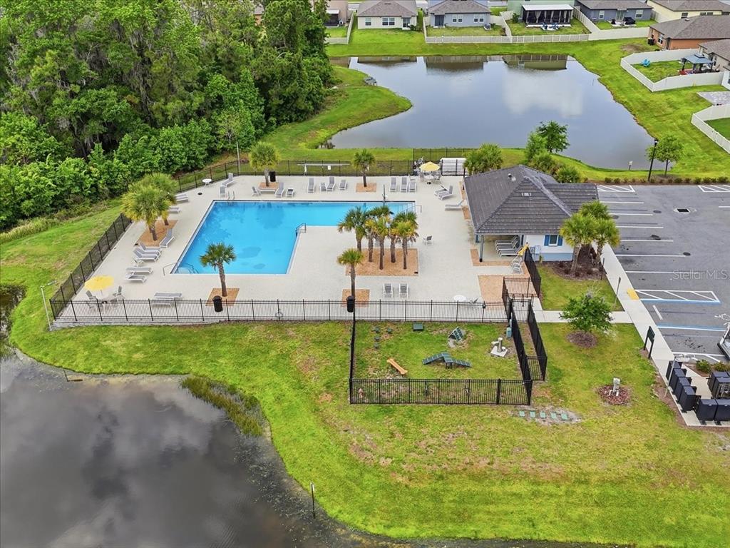 1923 Red Loop Lakeland, FL 33801 - Photo 47 of 51 an aerial view of a house with a yard and lake view