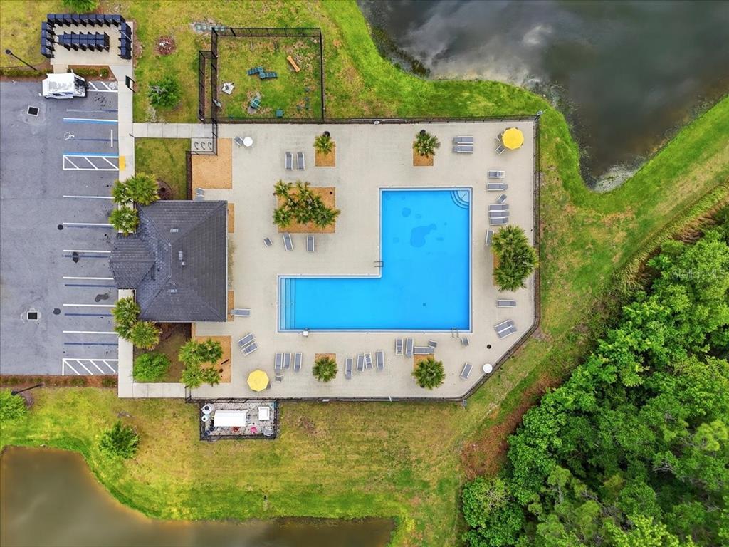 1923 Red Loop Lakeland, FL 33801 - Photo 49 of 51 an aerial view of a house with a swimming pool