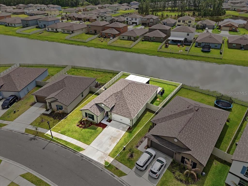 1923 Red Loop Lakeland, FL 33801 - Photo 8 of 51 an aerial view of a swimming pool and outdoor space