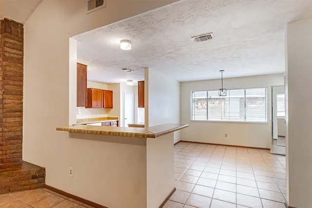 a view of kitchen with windows