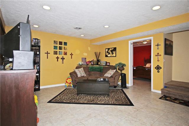 3330 Ott Wilson Road Springfield, TN 37172 - Photo 7 of 17 a living room with furniture a rug and a flat screen tv