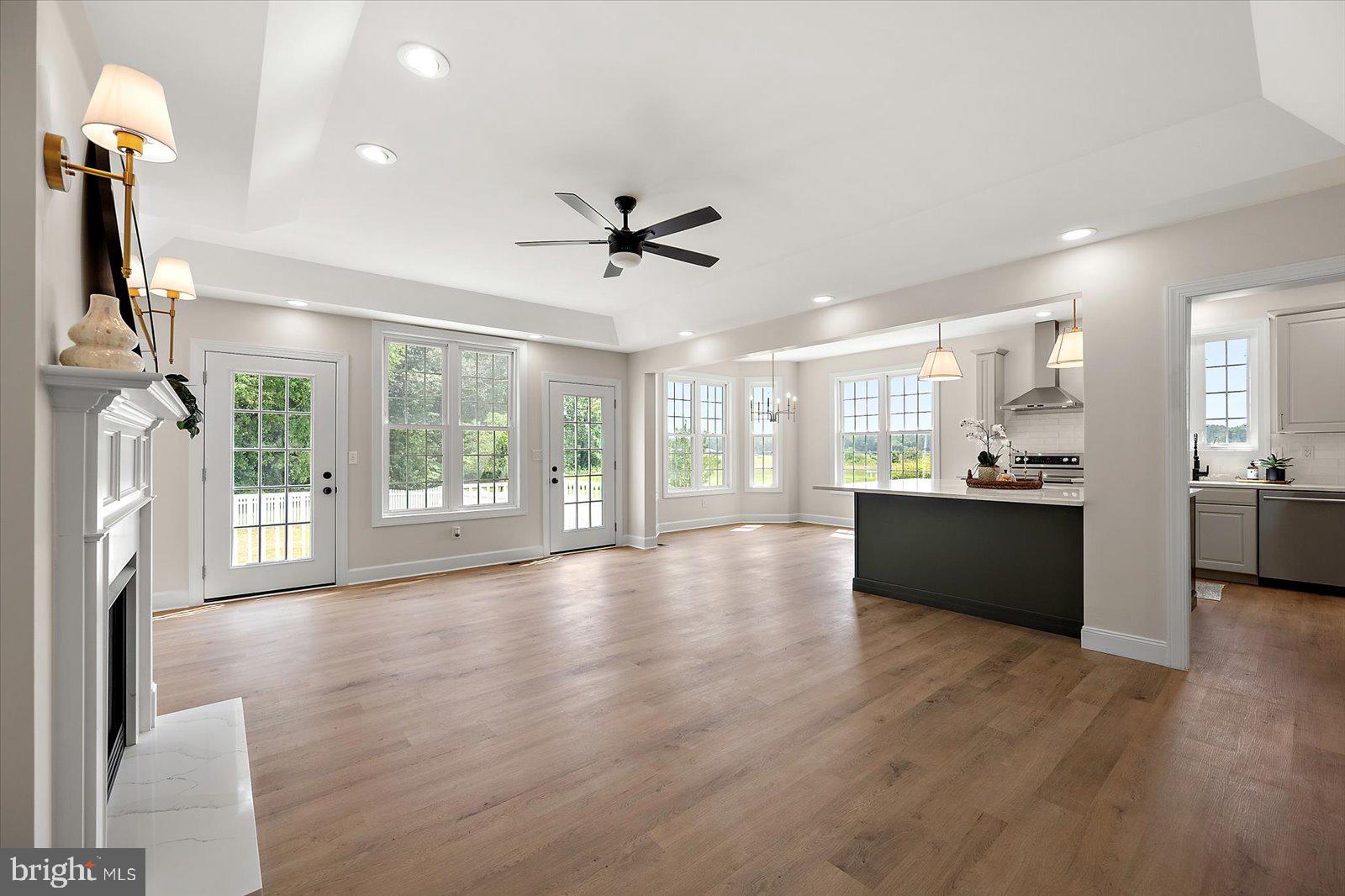26161 Bosch Lane Hebron, MD 21830 - Photo 16 of 49 a view of kitchen with refrigerator and wooden floor