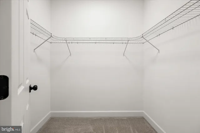 a view of a swimming pool and an outdoor space