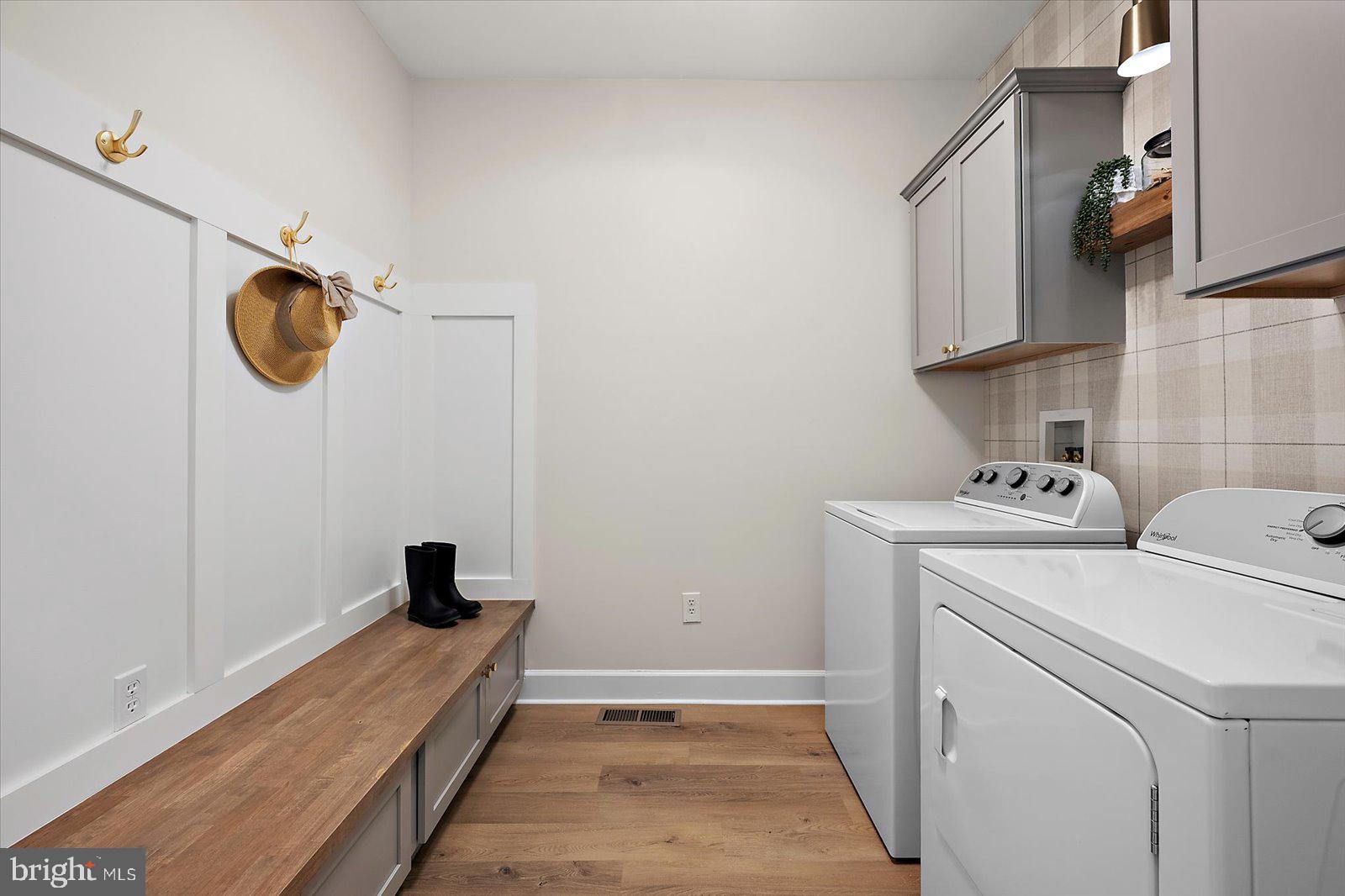26161 Bosch Lane Hebron, MD 21830 - Photo 38 of 49 a view of storage and utility room with a washer and dryer