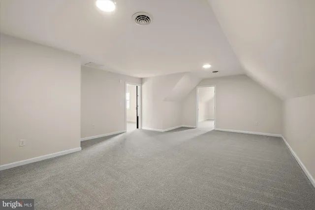 a view of a house with backyard and swimming pool