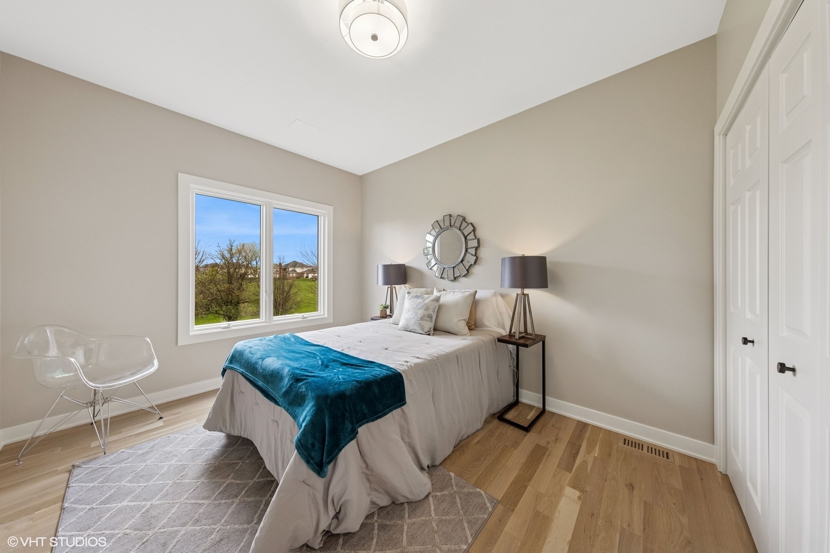 6878 Fieldstone Drive Burr Ridge, IL 60527 - Photo 19 of 45 a bedroom with a bed and window