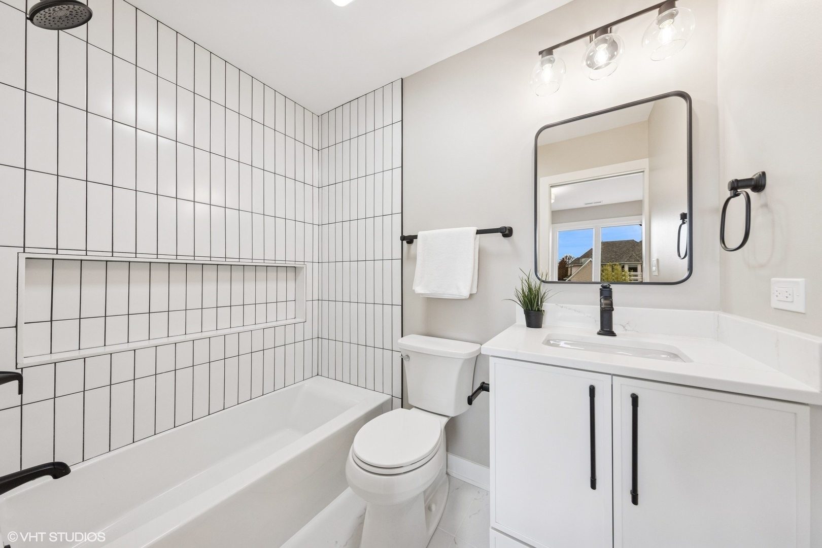 6878 Fieldstone Drive Burr Ridge, IL 60527 - Photo 30 of 45 a bathroom with a sink toilet and shower