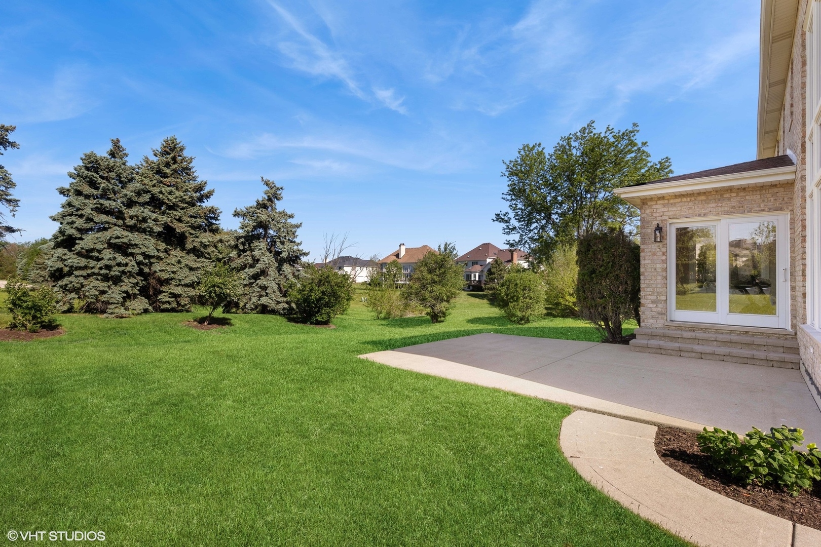 6878 Fieldstone Drive Burr Ridge, IL 60527 - Photo 43 of 45 a view of a house with a backyard