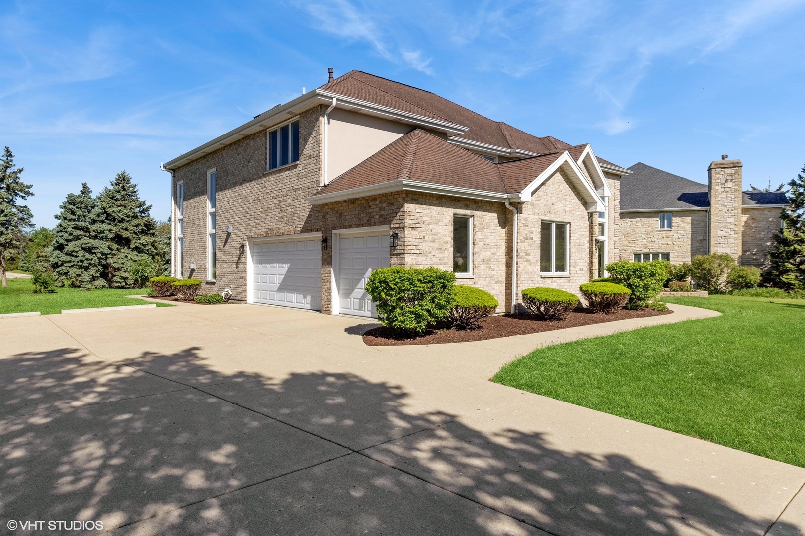 6878 Fieldstone Drive Burr Ridge, IL 60527 - Photo 45 of 45 a front view of a house with a yard