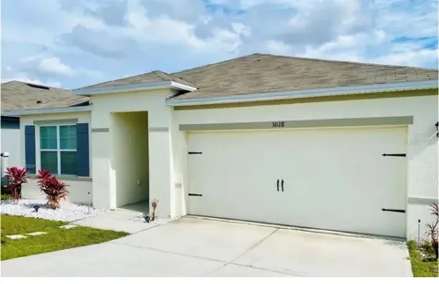 a view of a porch with furniture