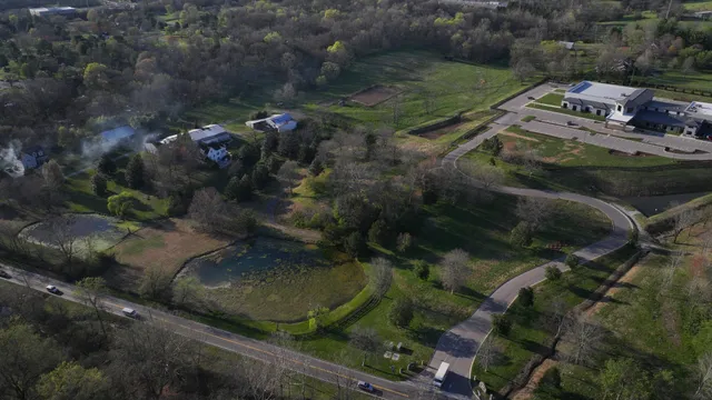 an aerial view of residential house with outdoor space