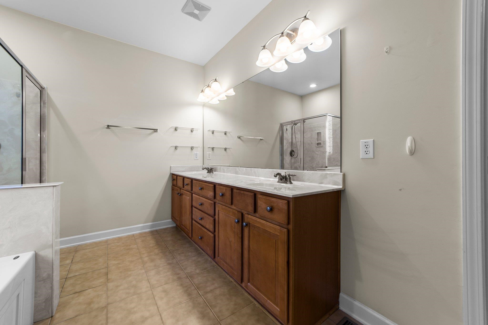 104 Harkness Circle Durham, NC 27705 - Photo 13 of 23 a bathroom with a sink vanity and a mirror