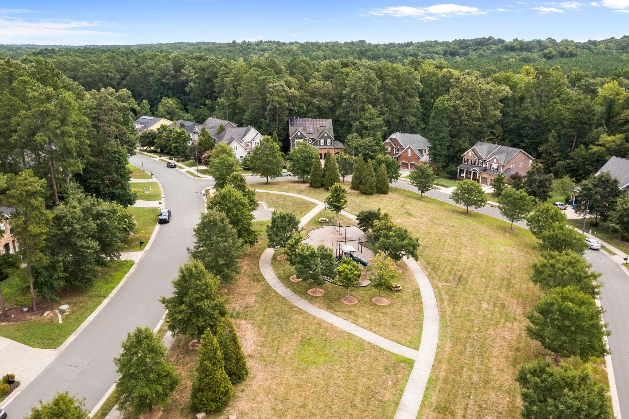 104 Harkness Circle Durham, NC 27705 - Photo 21 of 23 a view of a lake with a mountain