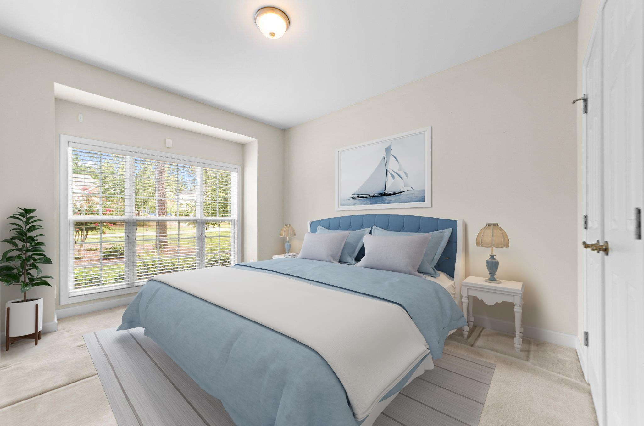 104 Harkness Circle Durham, NC 27705 - Photo 3 of 23 a bedroom with a large bed and a large window