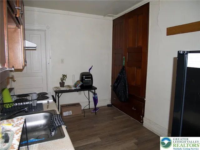 a room with furniture and a gate