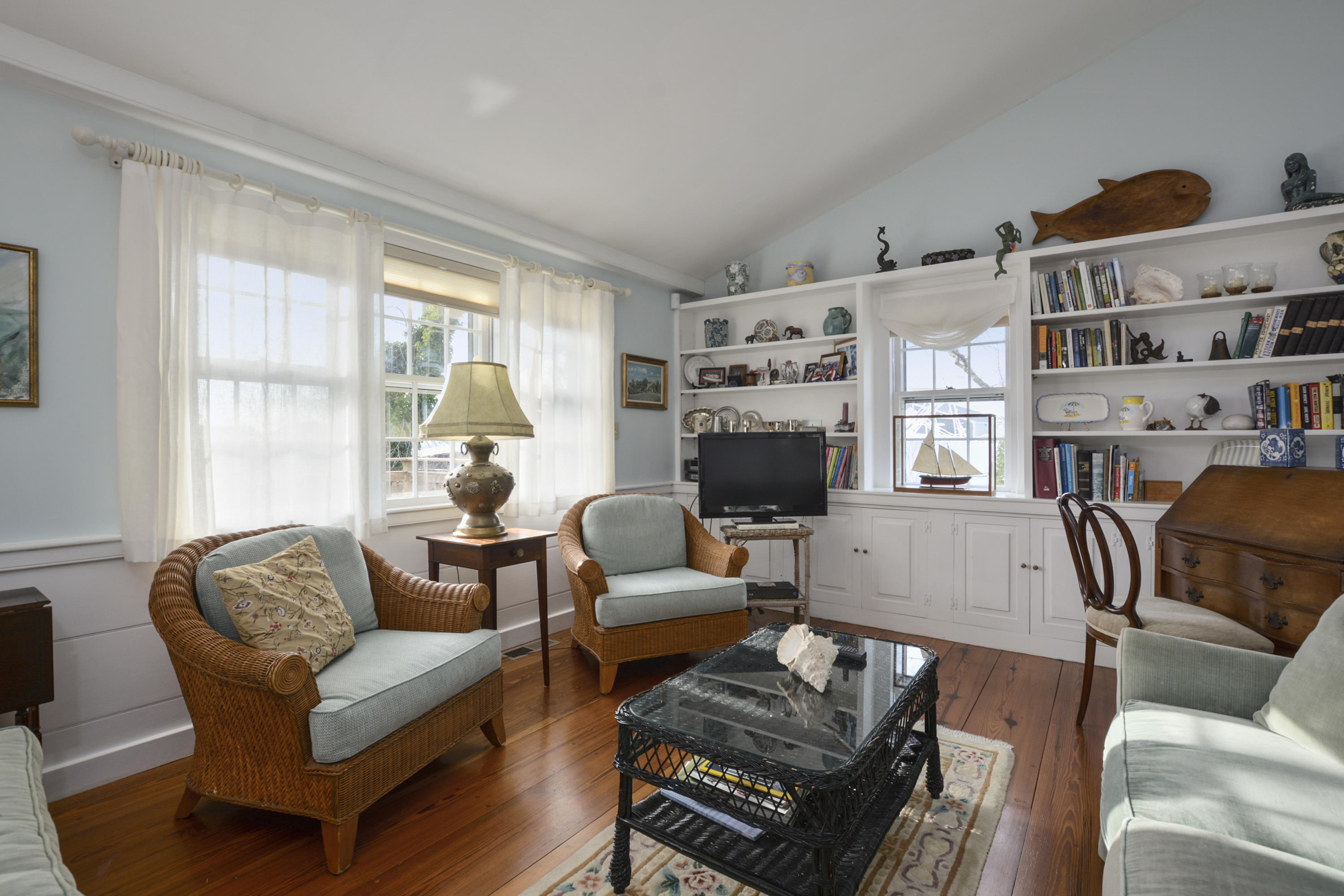 18 Peaks Drive Osterville, MA 02655 - Photo 11 of 40 a living room with furniture fireplace and a large window