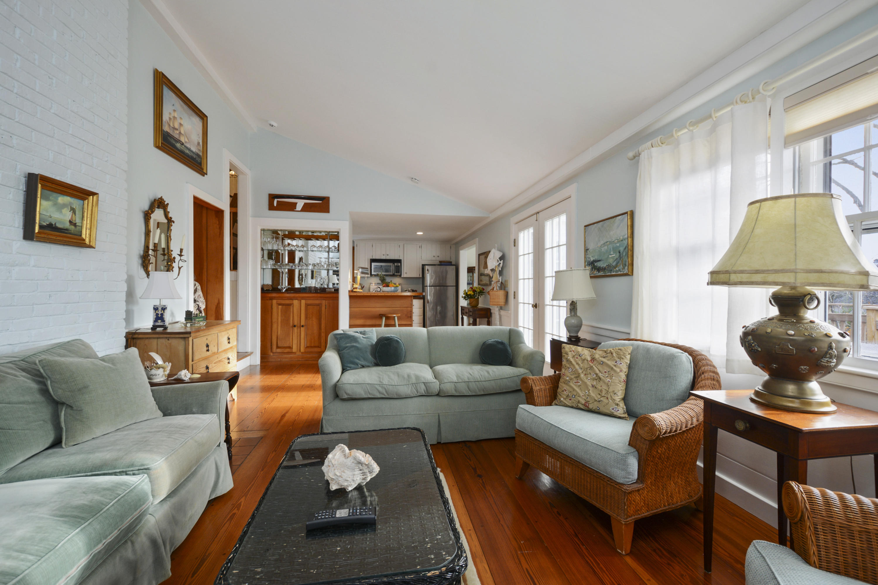 18 Peaks Drive Osterville, MA 02655 - Photo 12 of 40 a living room with furniture and a lamp