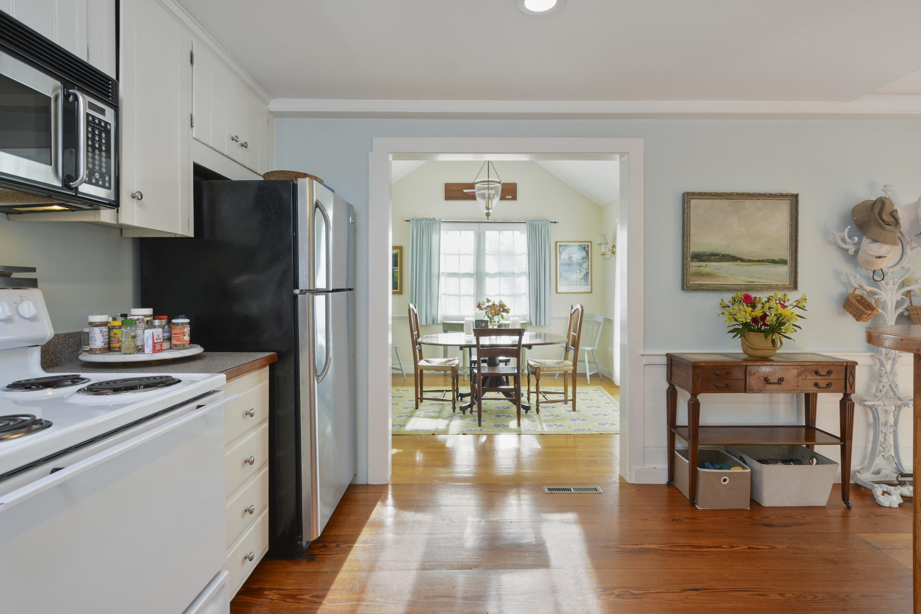 18 Peaks Drive Osterville, MA 02655 - Photo 19 of 40 a kitchen with stainless steel appliances granite countertop a refrigerator and a stove top oven