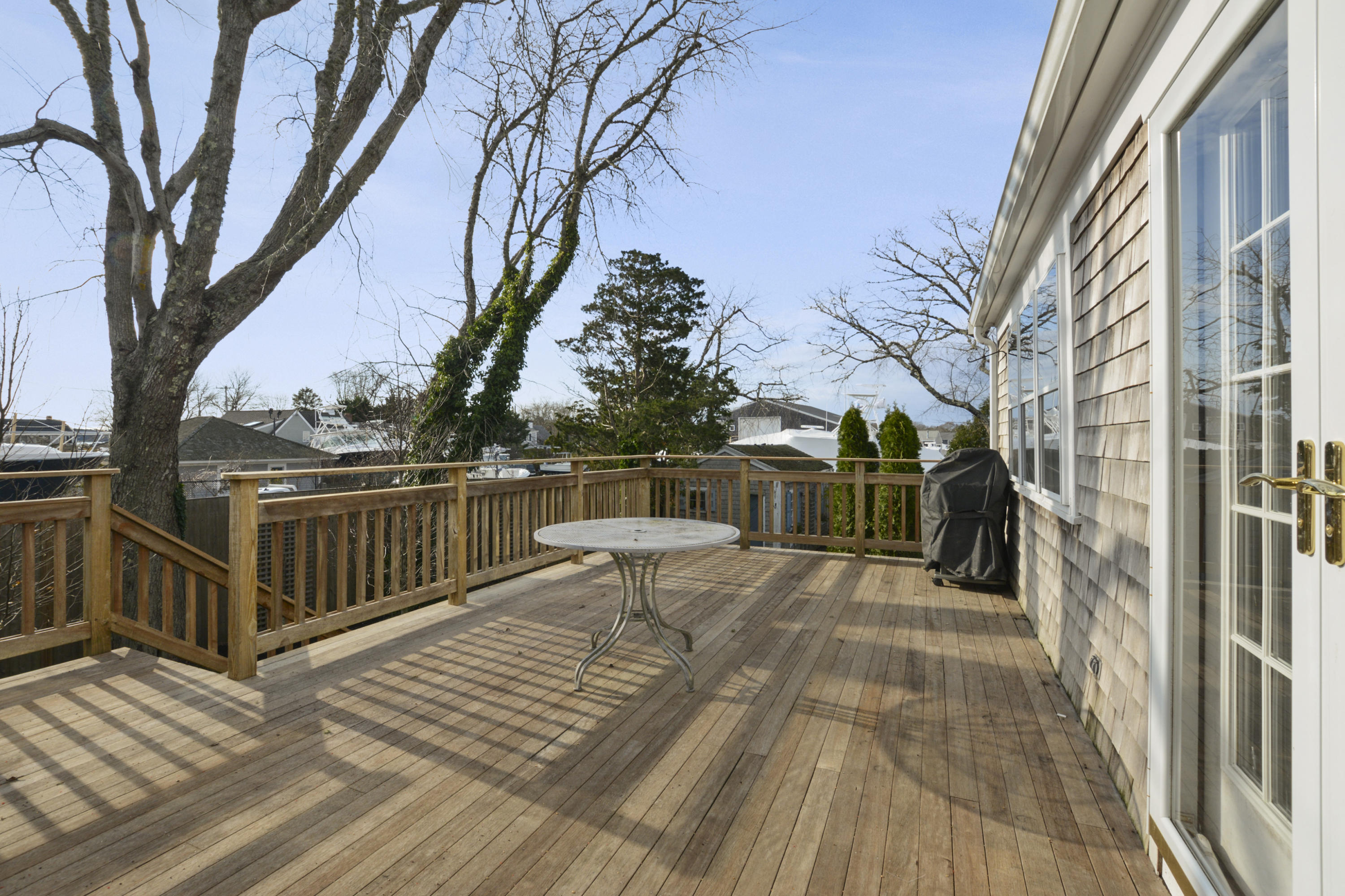 18 Peaks Drive Osterville, MA 02655 - Photo 33 of 40 a view of a house with wooden deck