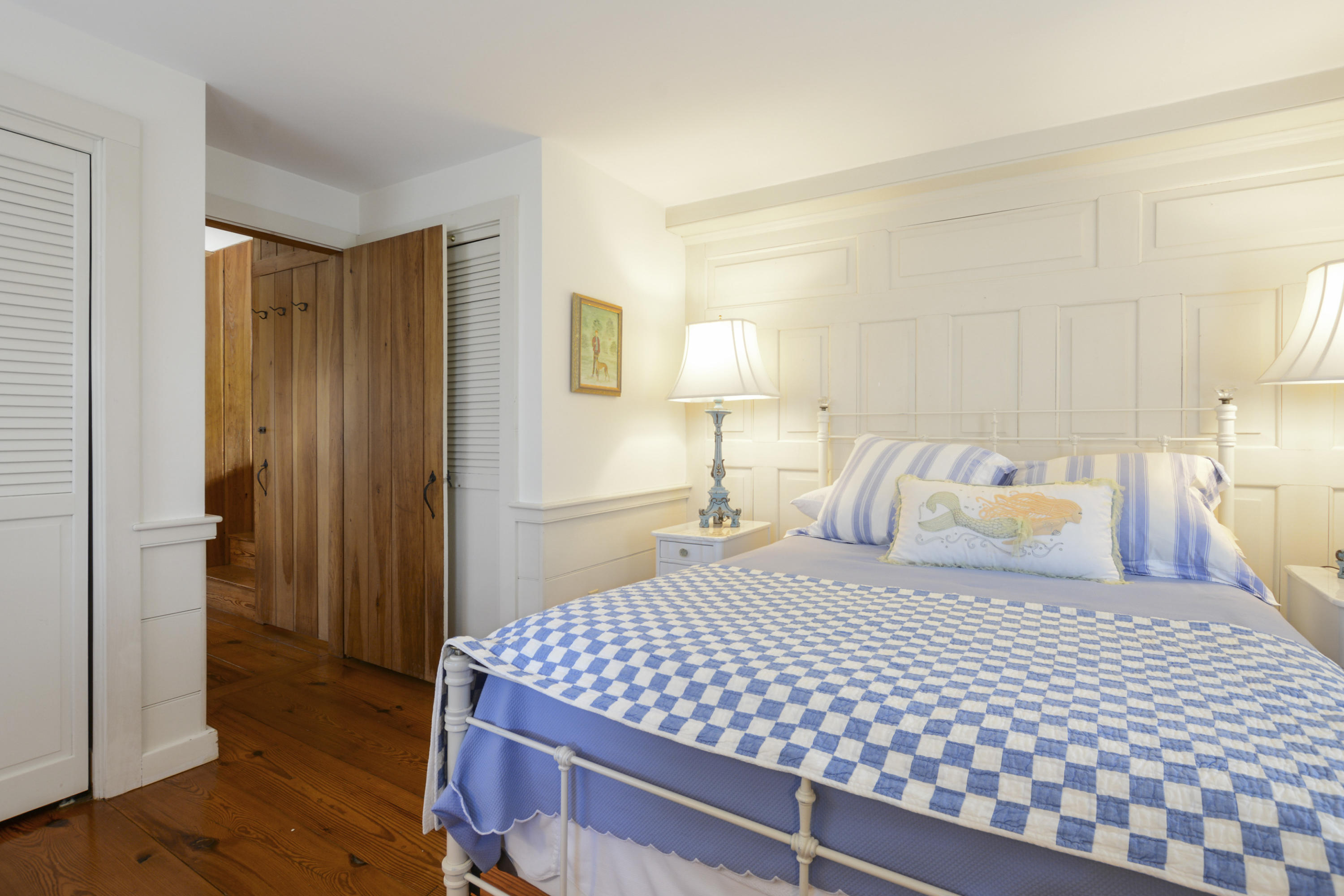 18 Peaks Drive Osterville, MA 02655 - Photo 6 of 40 a bedroom with a bed and wooden floor