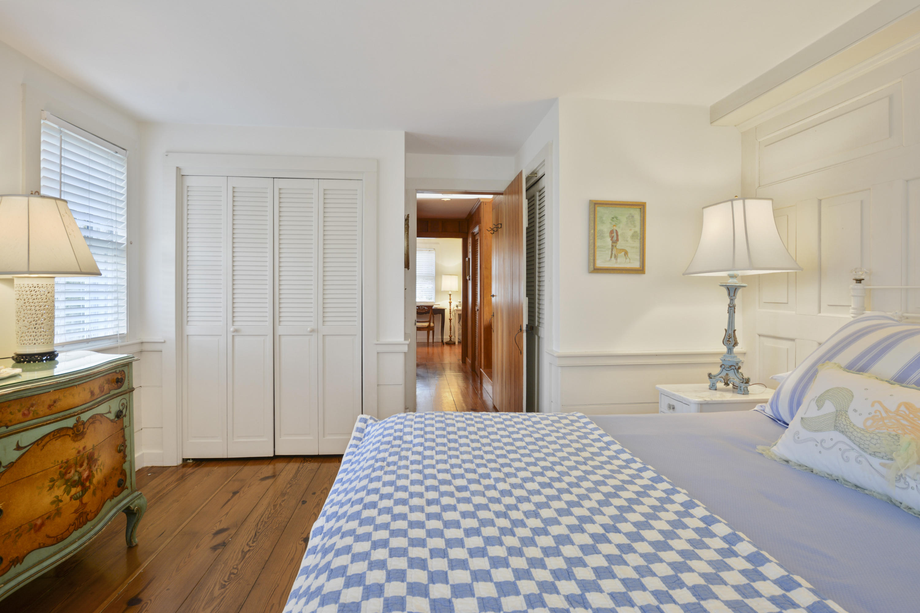 18 Peaks Drive Osterville, MA 02655 - Photo 7 of 40 a bedroom with a bed and a lamp on dresser