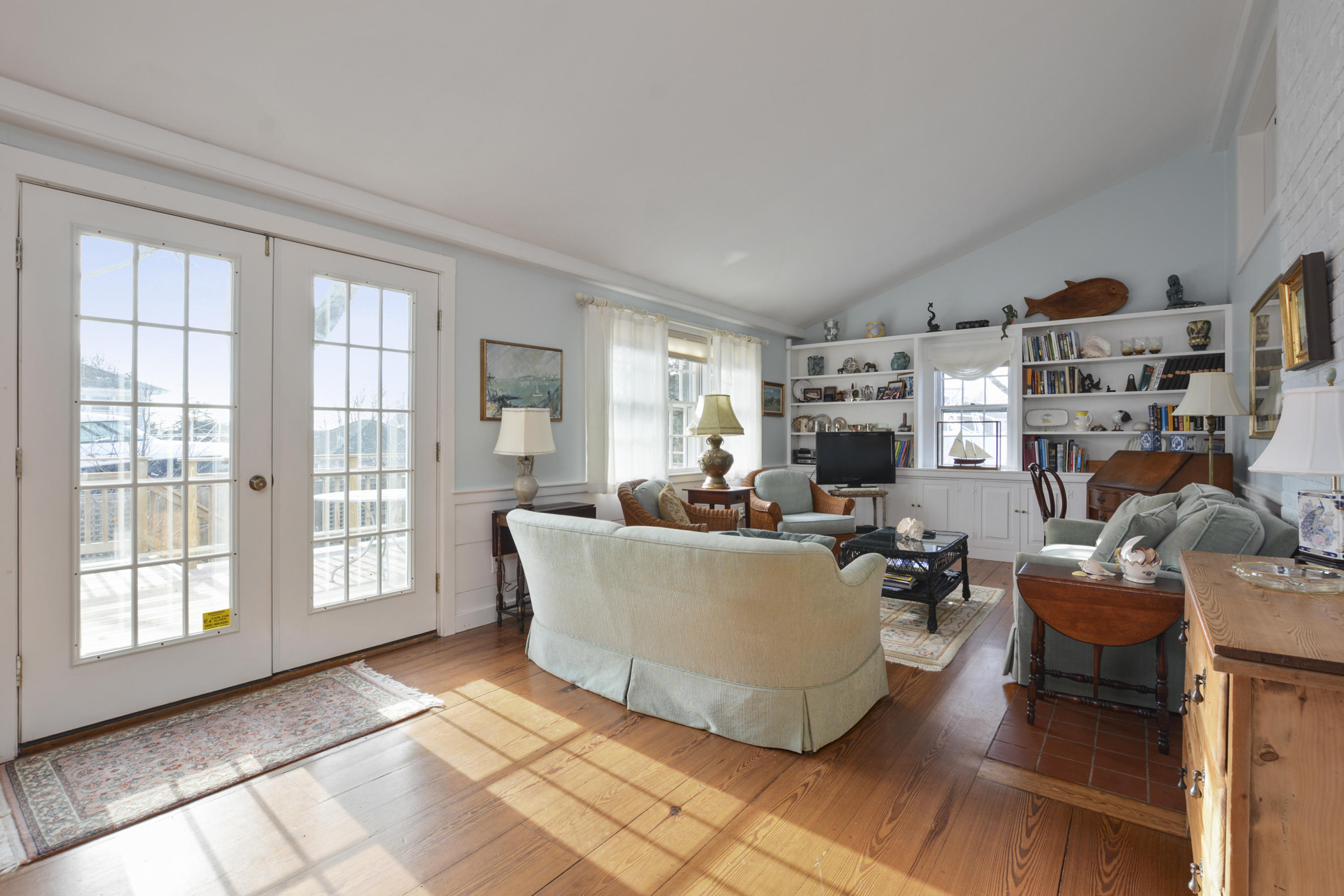 18 Peaks Drive Osterville, MA 02655 - Photo 10 of 40 a living room with furniture and a flat screen tv