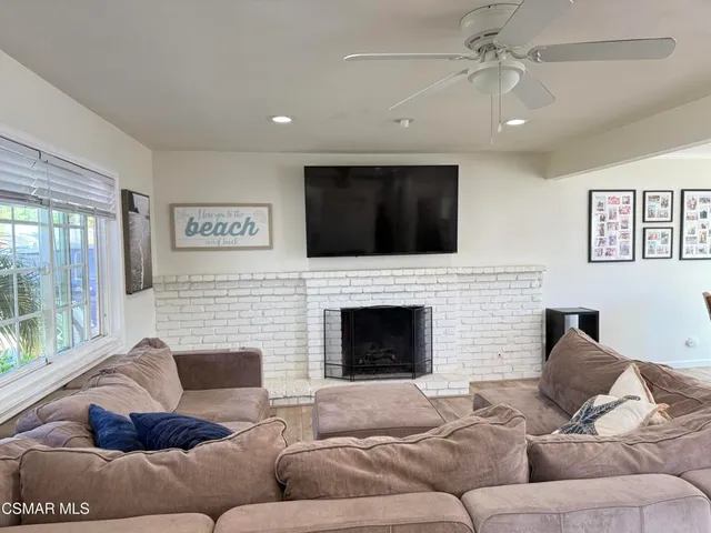 a living room with furniture or fireplace and a flat screen tv