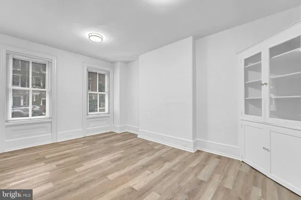 a view of empty room with windows