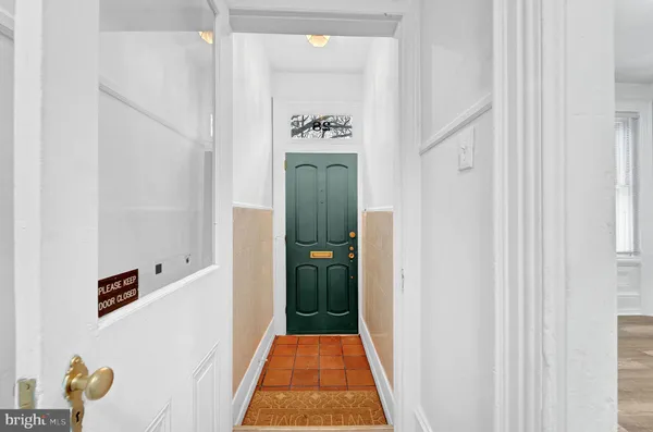 a view of a hallway with closet