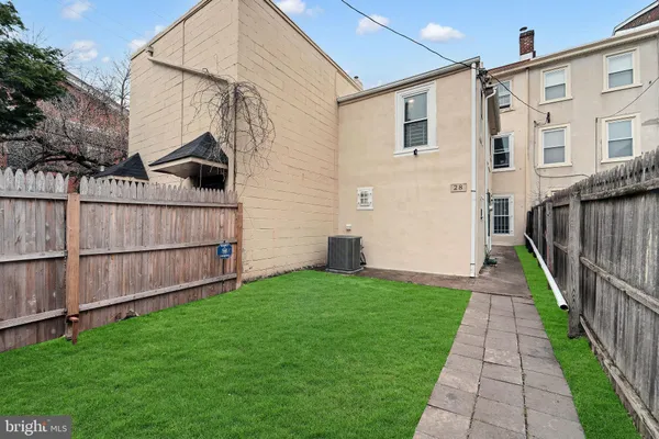 a view of a back yard of the house