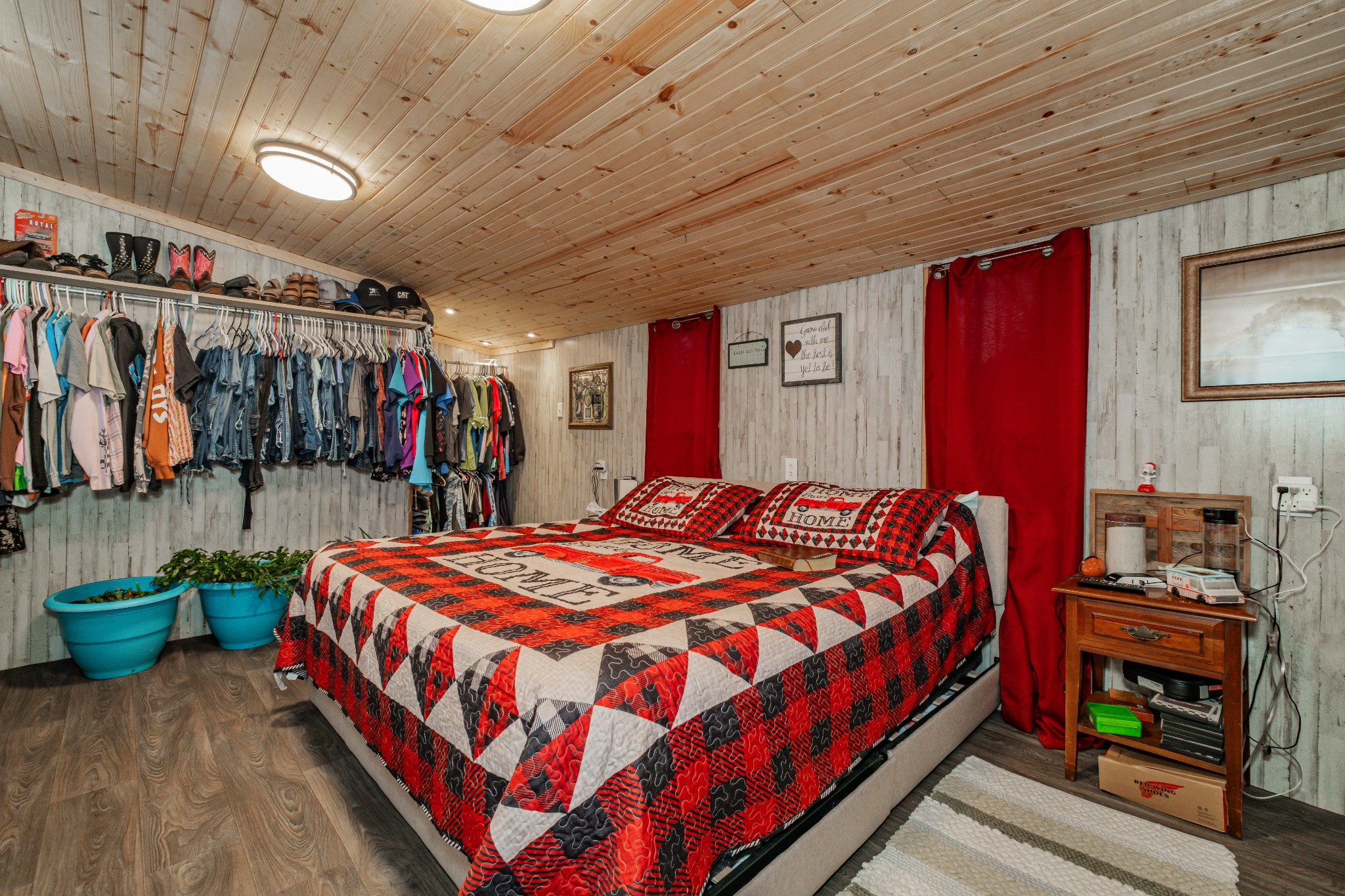 73 Spring Lake Circle Beechgrove, TN 37018 - Photo 29 of 43 a bedroom with a bed a dresser and a walk in closet