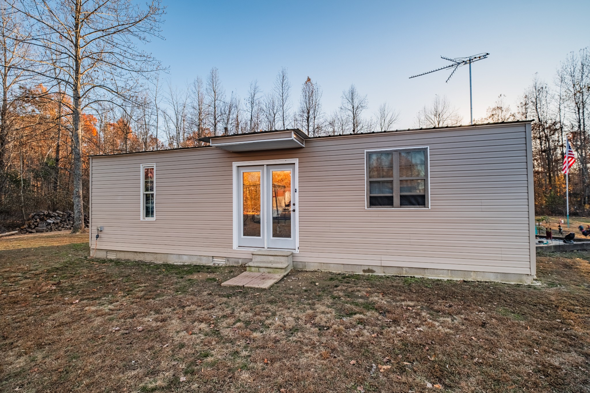 73 Spring Lake Circle Beechgrove, TN 37018 - Photo 7 of 43 a view of a house with a yard and garage
