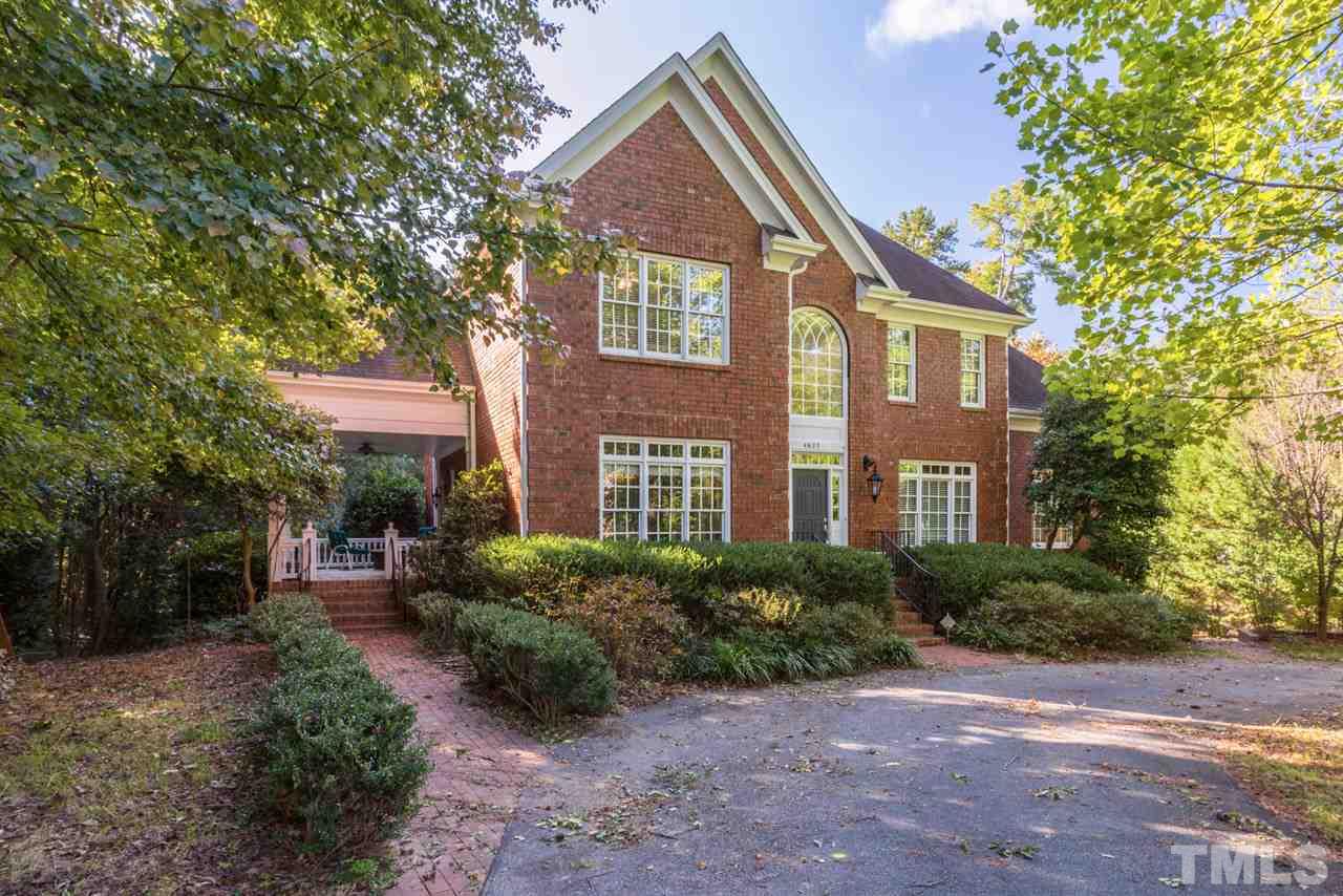 4625 Gamelyn Walk Raleigh, NC 27612 - Photo 1 of 25 a front view of a house with garden