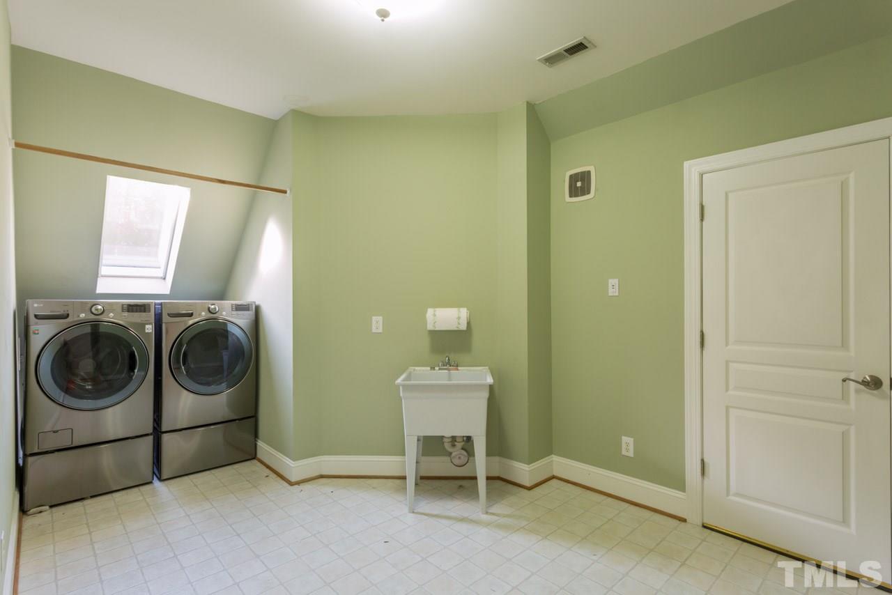 4625 Gamelyn Walk Raleigh, NC 27612 - Photo 18 of 25 a utility room with dryer and washer